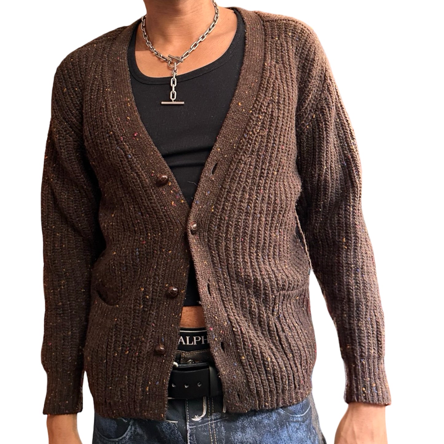 Brown knitted cardigan worn by a person on a white background