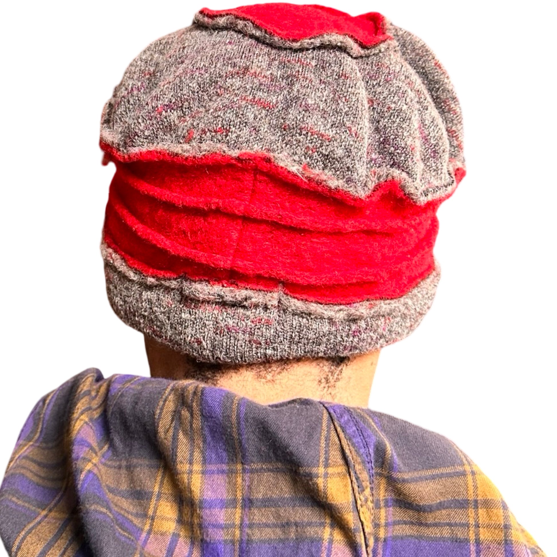 Back of ASTROBOI* red and grey pleated beanie with slouchy fit and patchwork panels, handmade in NYC.