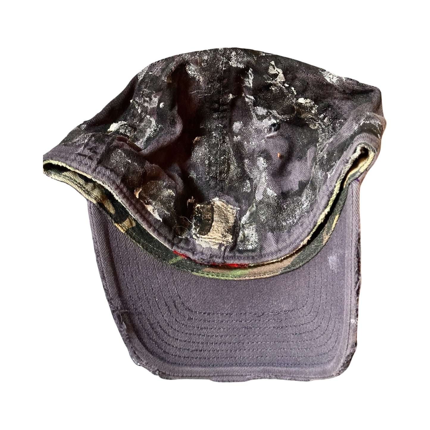 Flat back of ASTROBOI* navy fitted cap with custom black, white, and silver paint and distressed vintage finish.