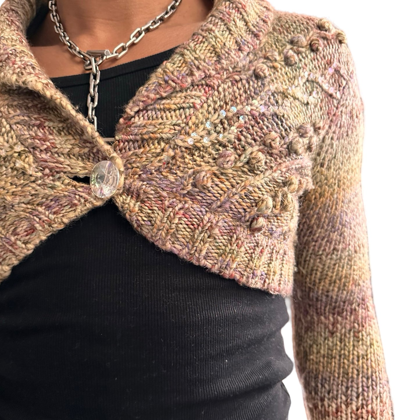 Vintage DKNY tan speckled cropped cable knit sweater with sequins and crystal button closure, women’s medium. close up front 