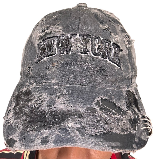 ASTROBOI* 'Orion' New York Black Distressed Resin Pierced Hat -  front 