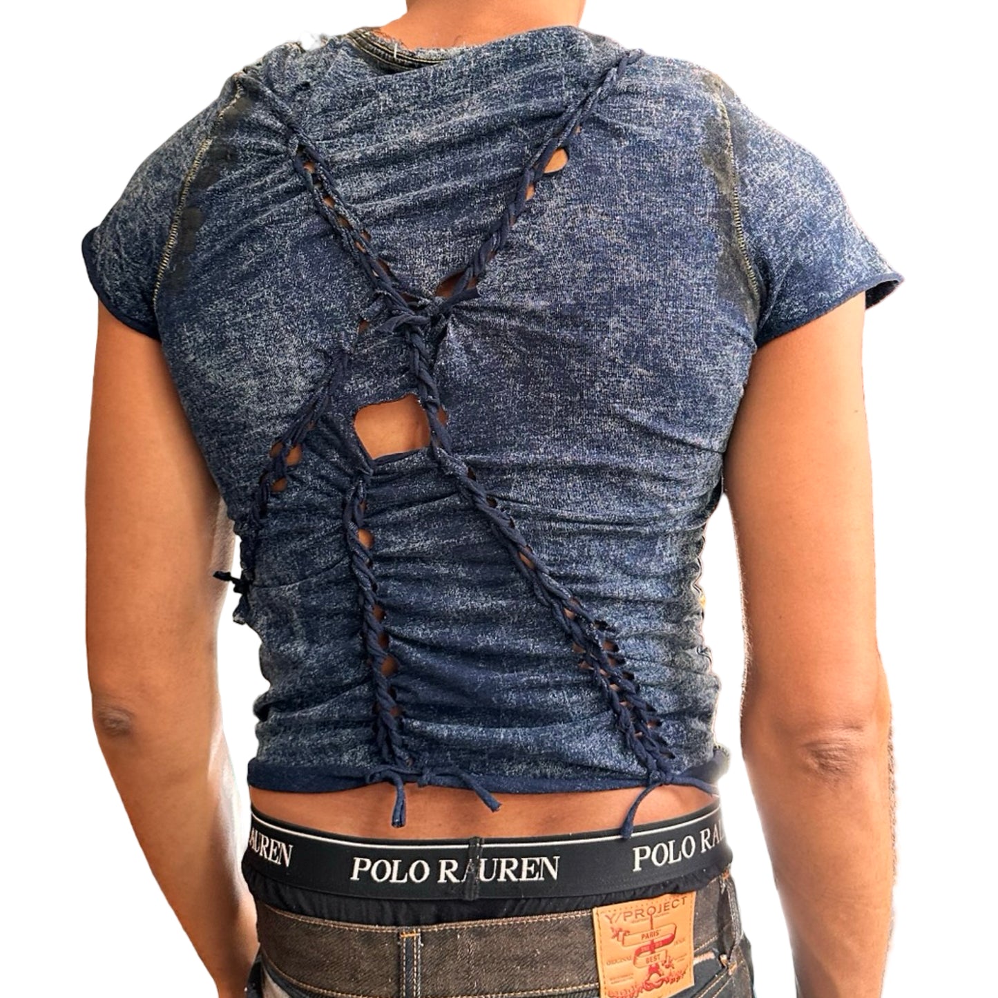 Back of ASTROBOI* blue acid-washed braided twist T-shirt with deconstructed pocket, slashes, hole details, and black paint accents. Custom NYC streetwear.