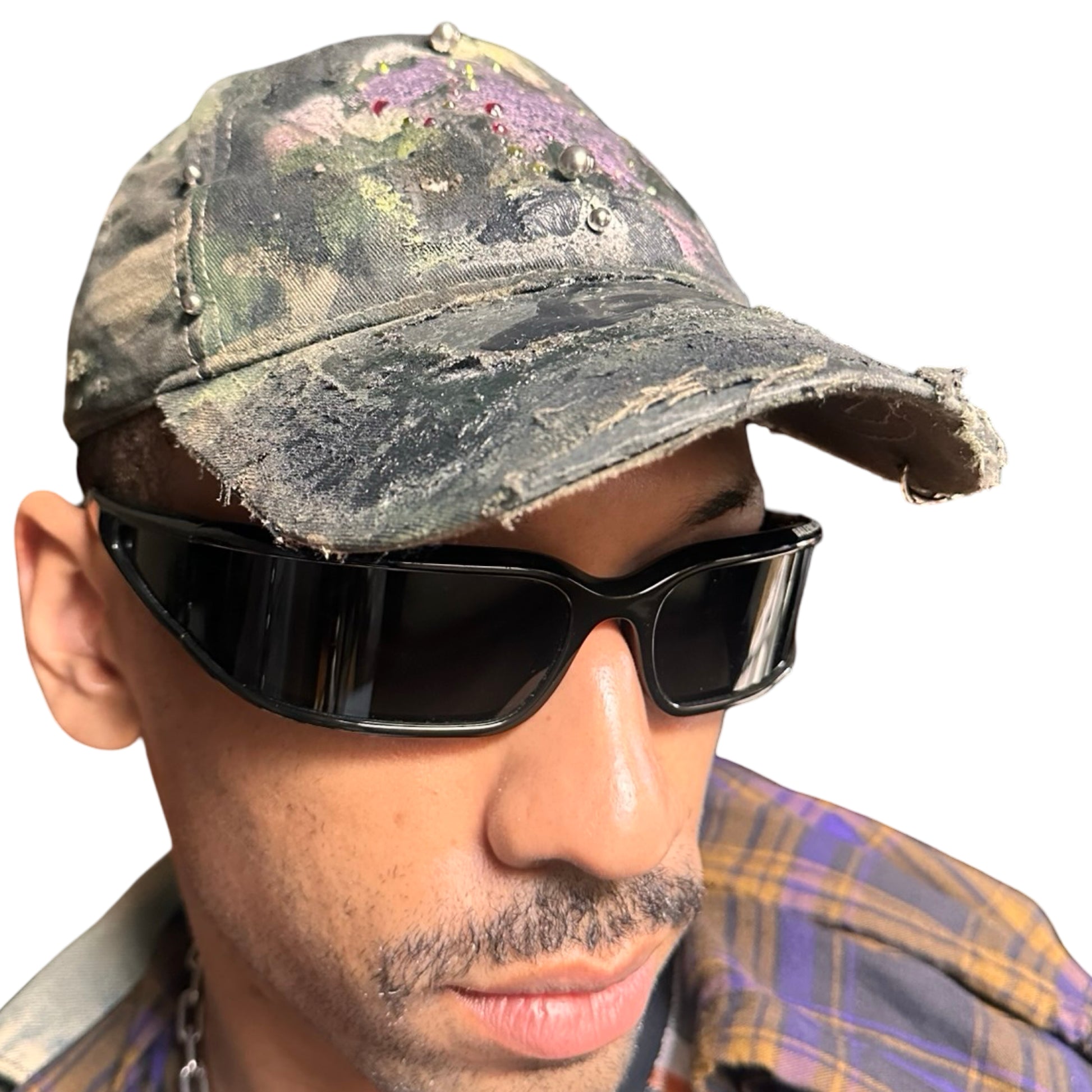 Front right of Green distressed hat with metallic rhinestones sealed in resin and stainless steel piercings, customized by ASTROBOI*.