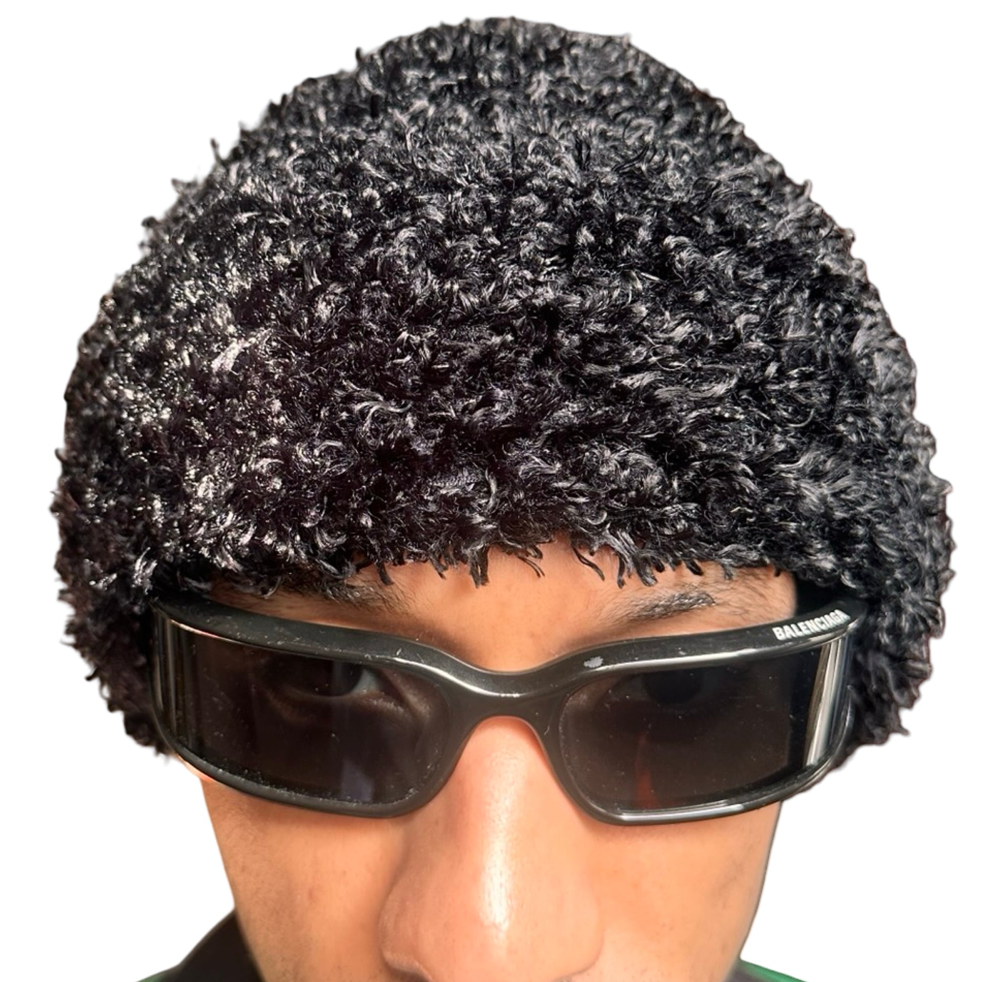 Close up of Vintage black fuzzy chunky knit beanie with double-lined construction and thick textured fabric, shown in good condition.