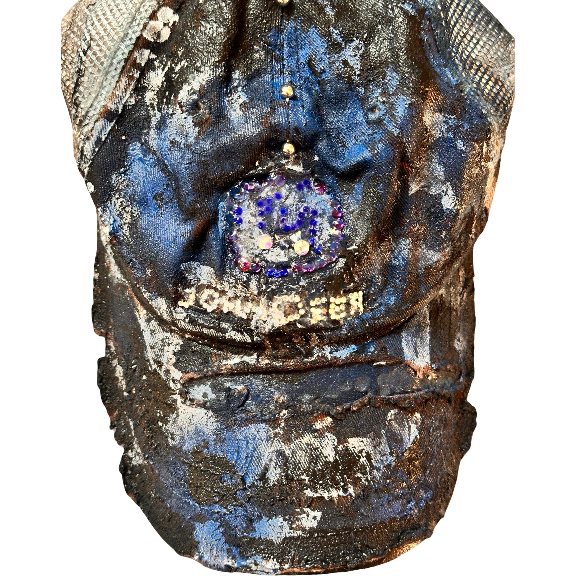 Flat close up of ASTROBOI* x John Deere black and blue distressed trucker hat with rhinestone resin logo and stainless steel piercings.