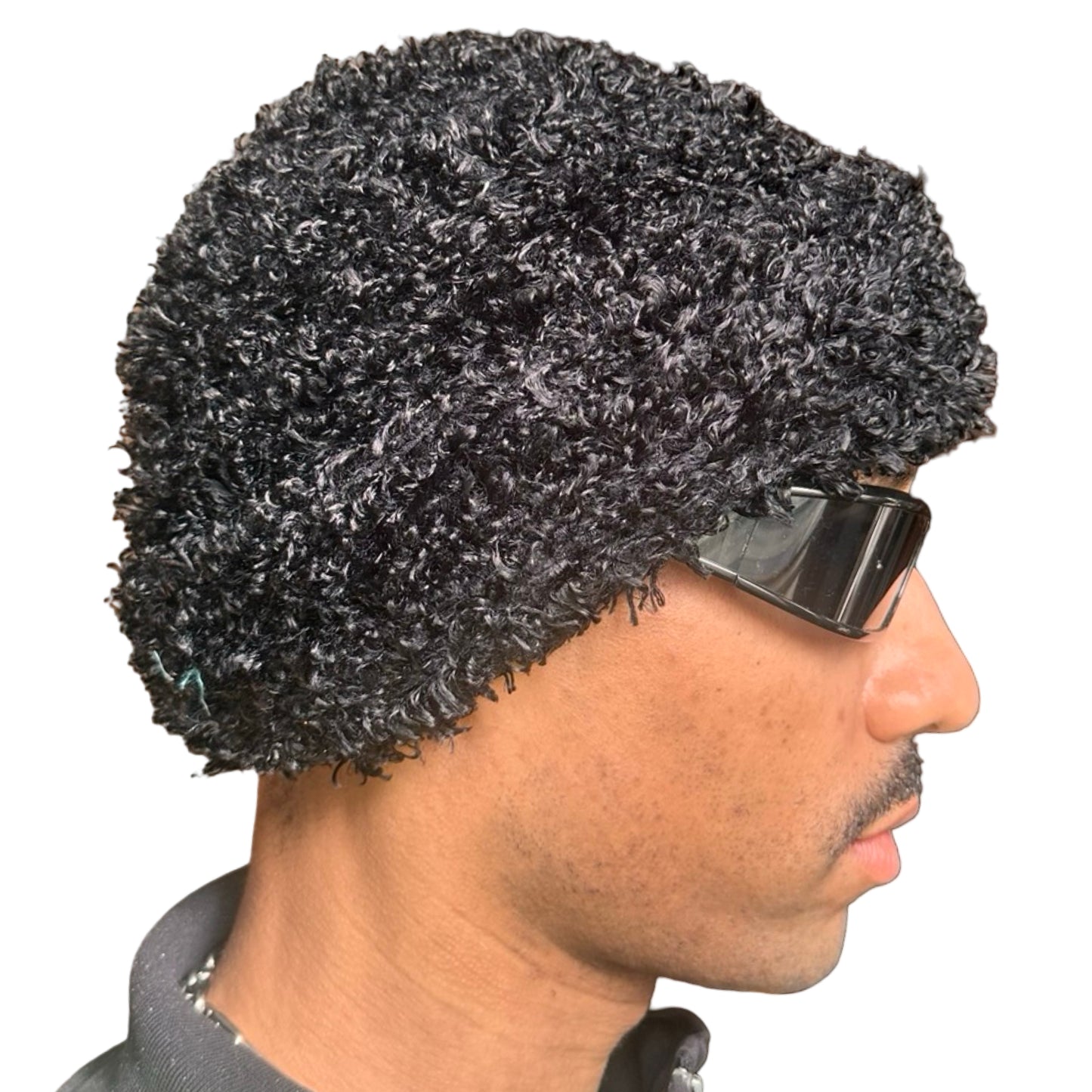 Right side of Vintage black fuzzy chunky knit beanie with double-lined construction and thick textured fabric, shown in good condition.