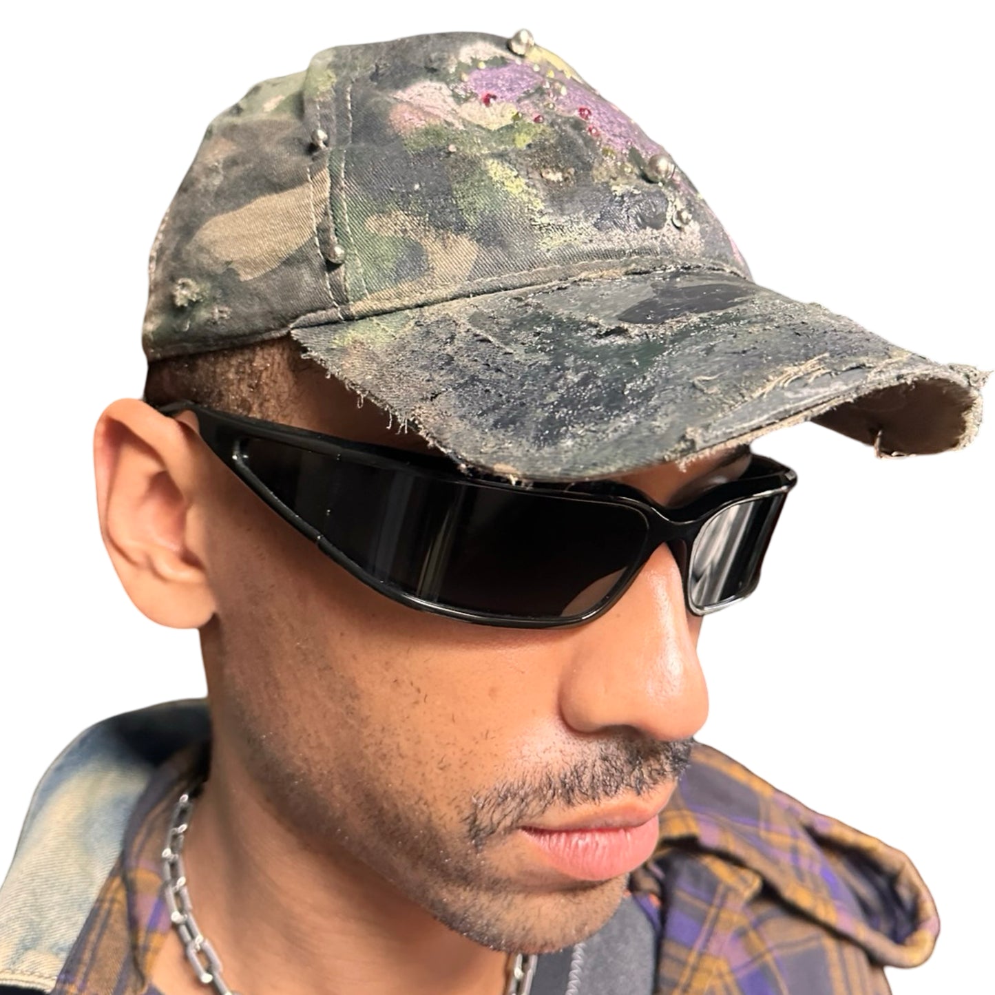 Front right side of Green distressed hat with metallic rhinestones sealed in resin and stainless steel piercings, customized by ASTROBOI*.