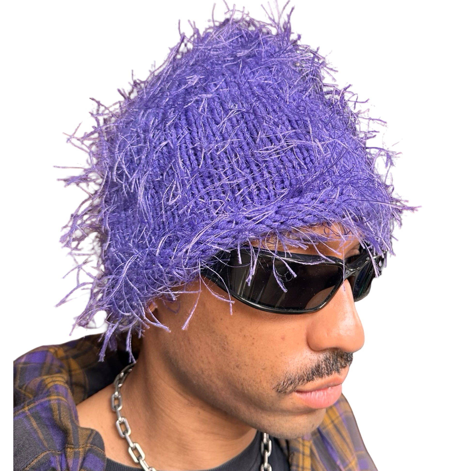 Front right of Lavender purple eyelash-yarn knit beanie with rolled edges and a soft, textured silhouette. Stretchy, cozy winter hat.
