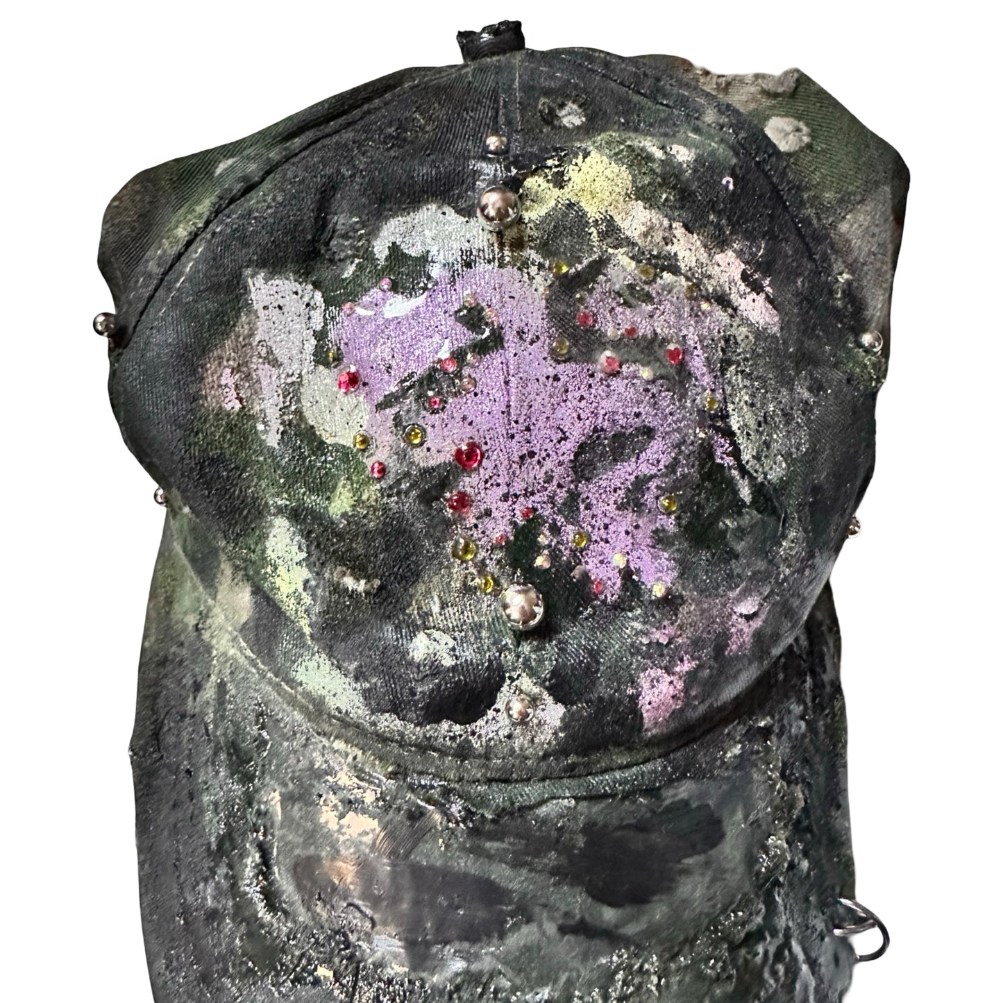 Front close up of Green distressed hat with metallic rhinestones sealed in resin and stainless steel piercings, customized by ASTROBOI*.