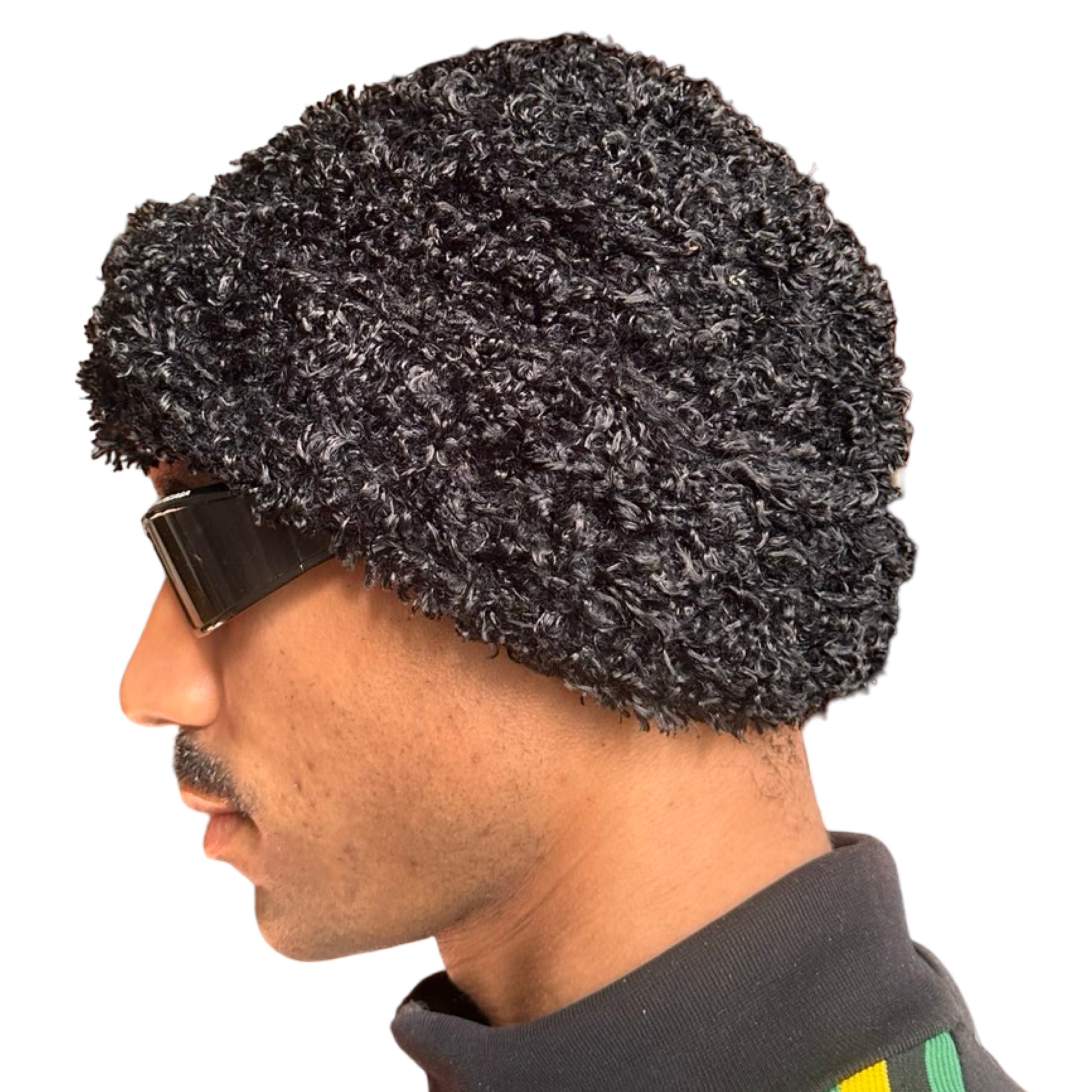 Right side of Vintage black fuzzy chunky knit beanie with double-lined construction and thick textured fabric, shown in good condition.