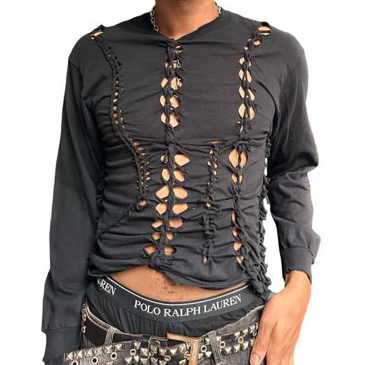 Front view of a person wearing a Black long-sleeve shirt with braided front. This top is perfect for festivals and parties 