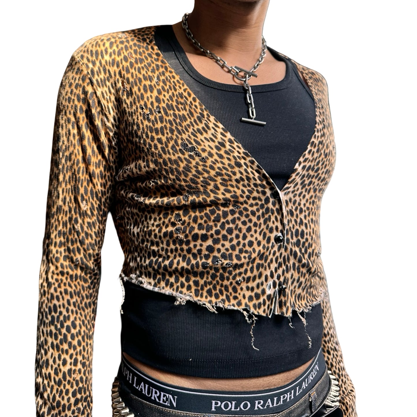 ASTROBOI* black and brown cheetah print grunge cardigan with raw hem, jewel buttons, and distressed knit details, size XL. front 2