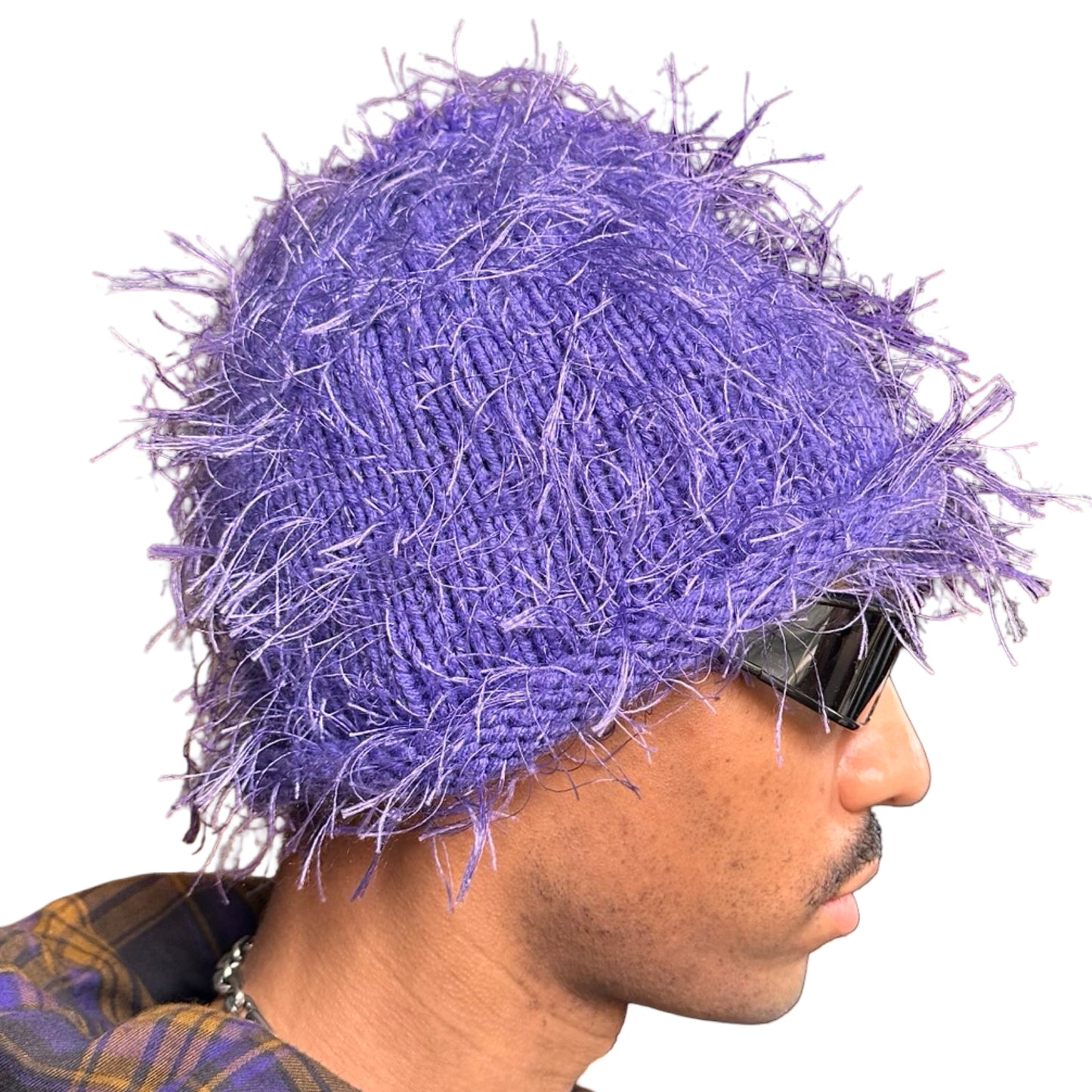 Right side of Lavender purple eyelash-yarn knit beanie with rolled edges and a soft, textured silhouette. Stretchy, cozy winter hat.