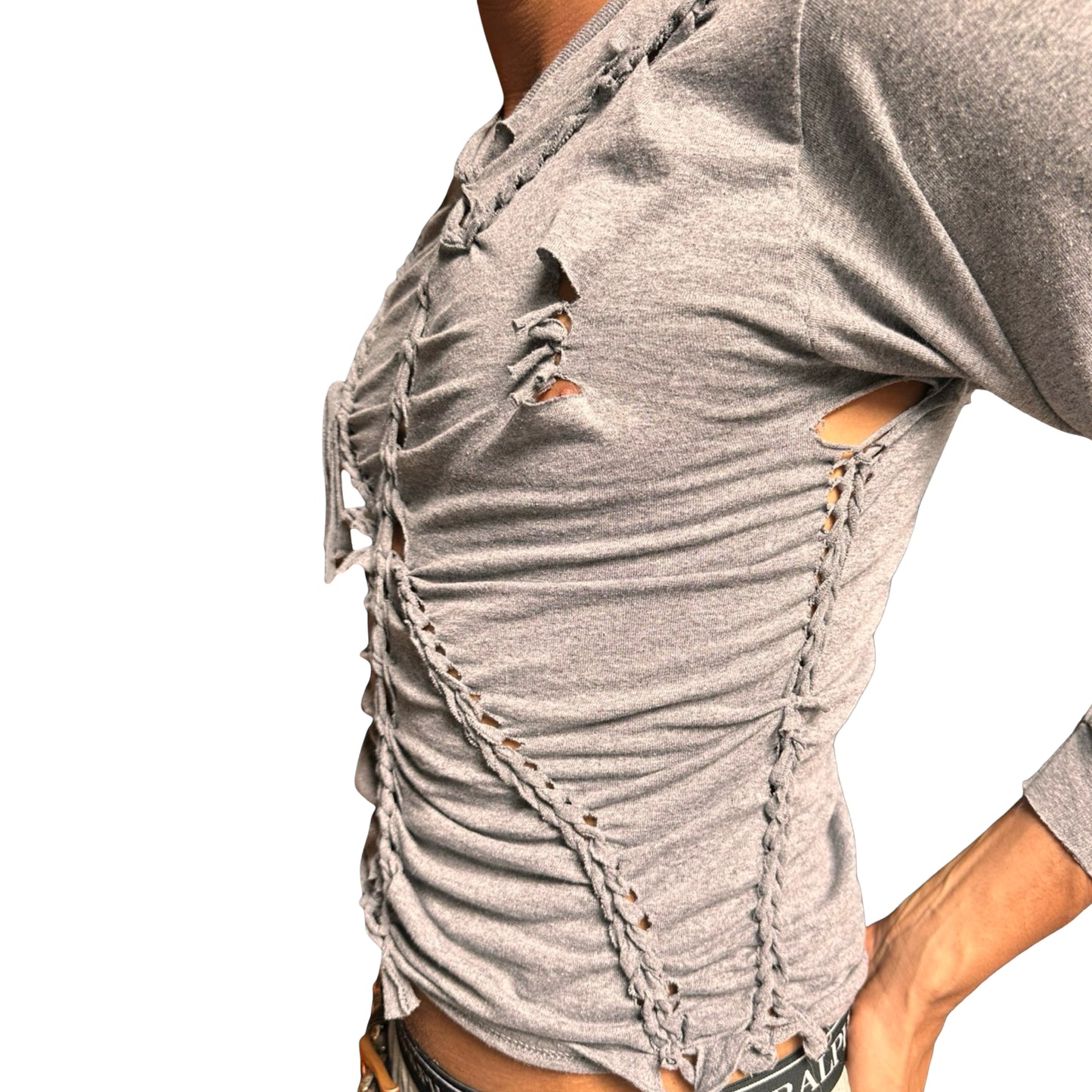 Gray distressed shirt with braided details on a white background