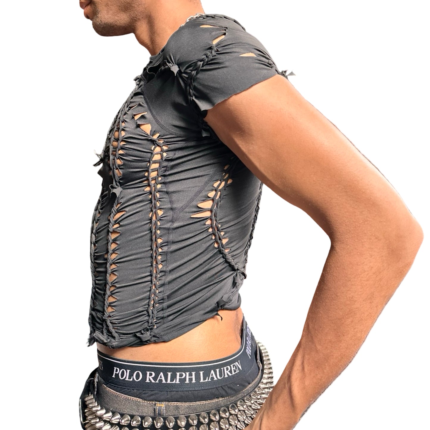 left side of ASTROBOI* 'Barely There' black braided twist compression top featuring intricate hand-braided detailing. Handmade in NYC with a form-fitting stretch design. 