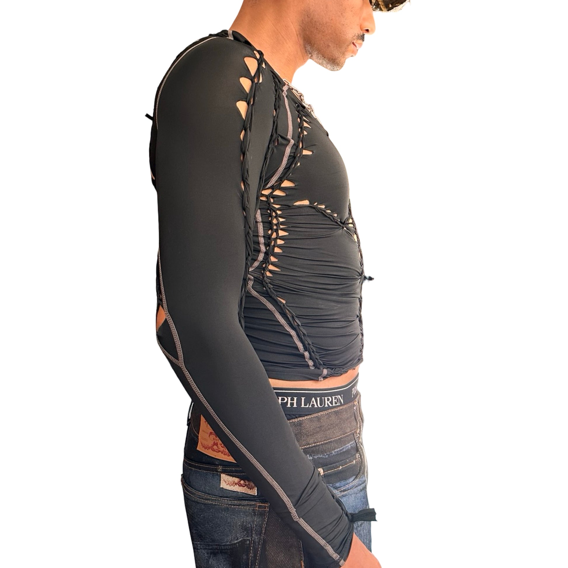 Right side of ASTROBOI* 'Mystique' black braided twist compression top with cut-out details. Handmade in NYC using breathable, moisture-wicking stretch fabric.