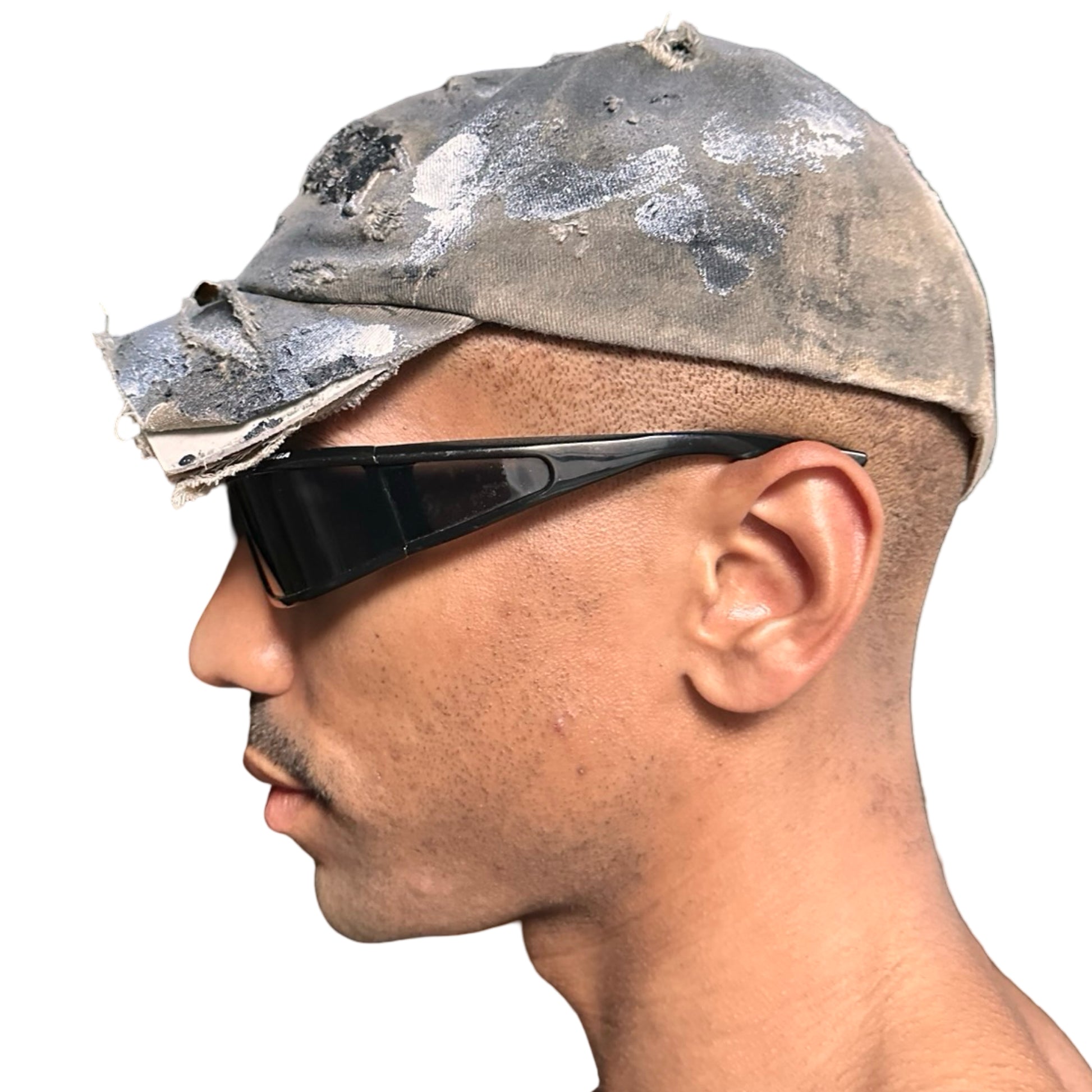 Left view of ASTROBOI* tan and black New York logo hat with distressed half visor and black and white paint detailing.