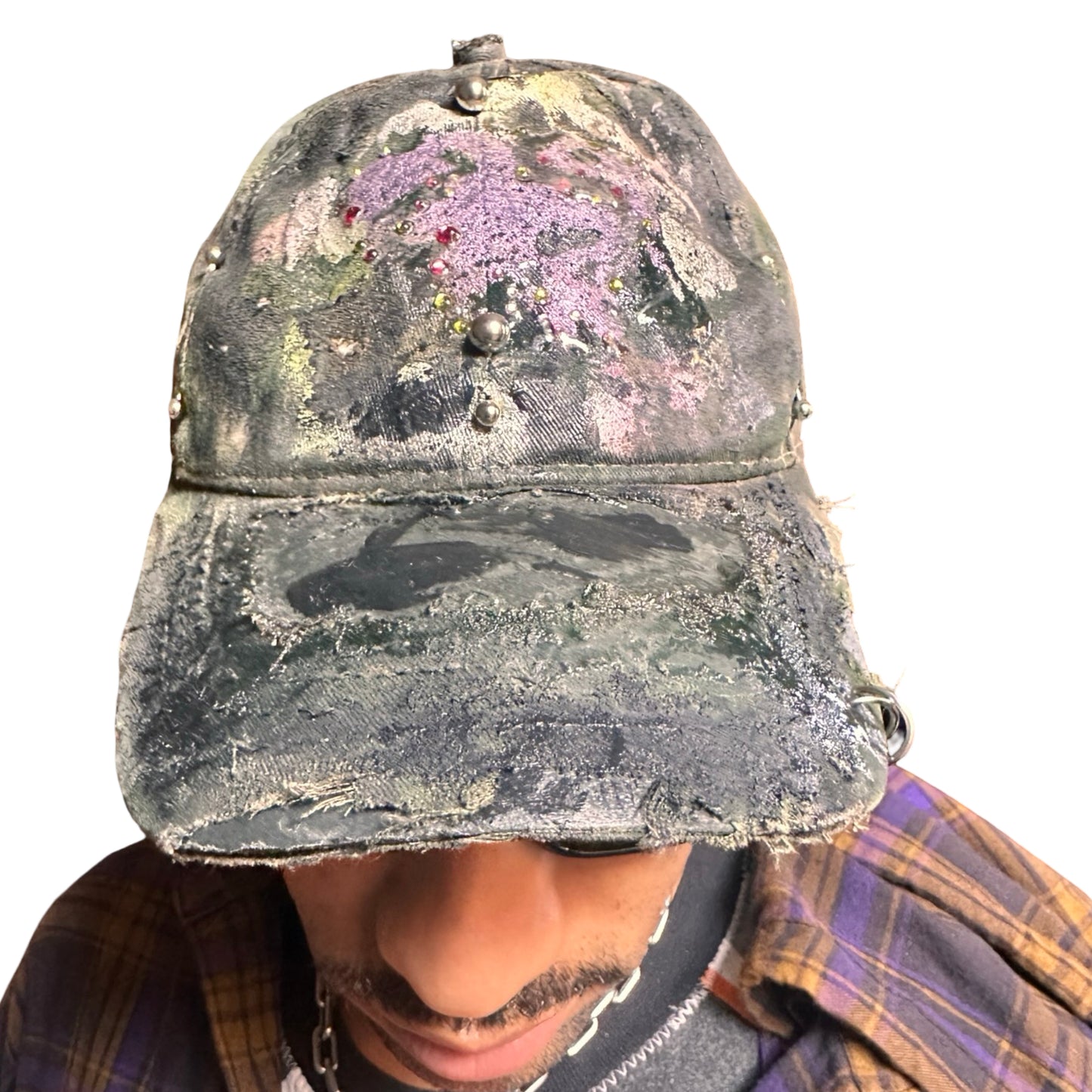 Front of Green distressed hat with metallic rhinestones sealed in resin and stainless steel piercings, customized by ASTROBOI*.