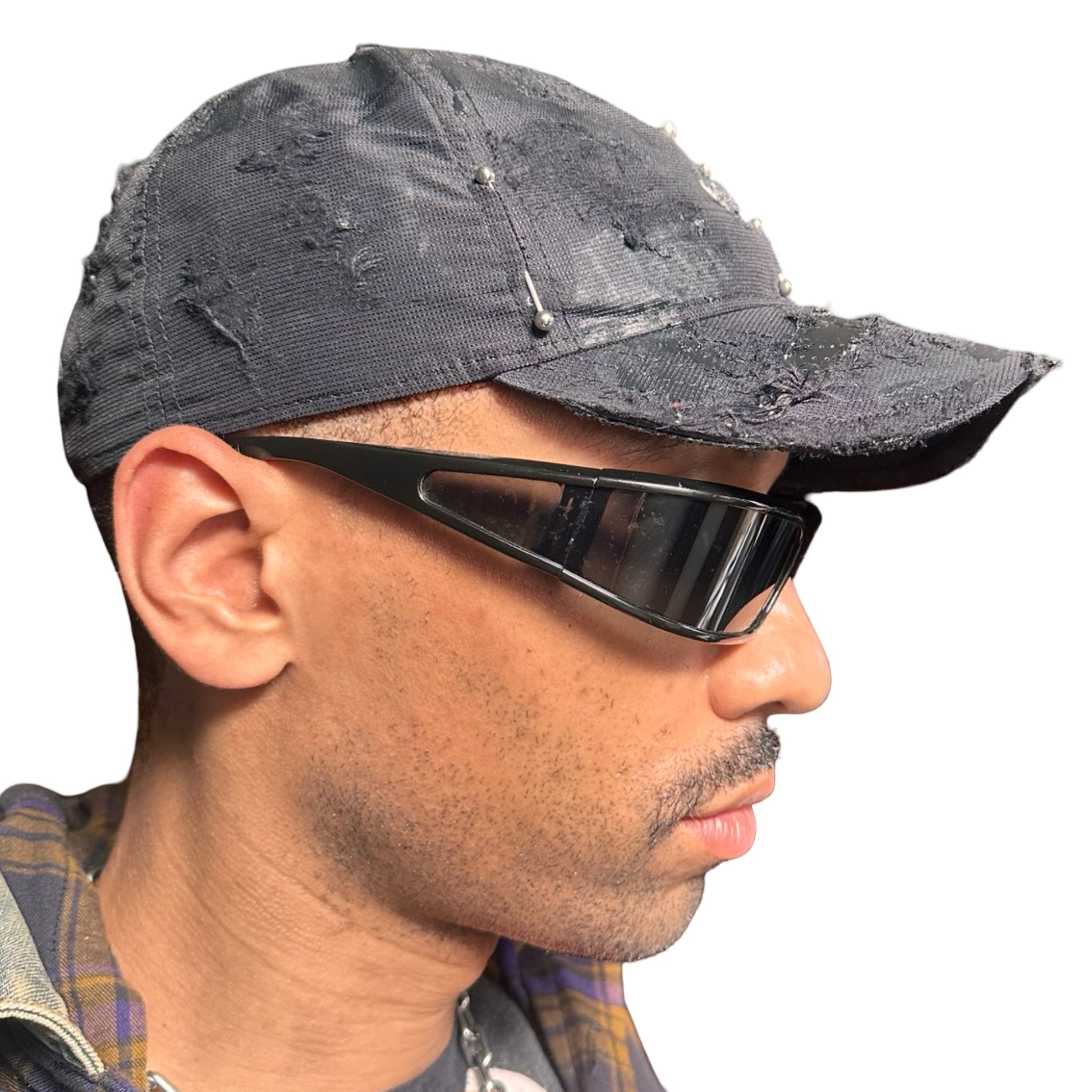 Right side of Black Adidas hat customized by ASTROBOI* with distressing, black painted accents, and stainless steel piercings.