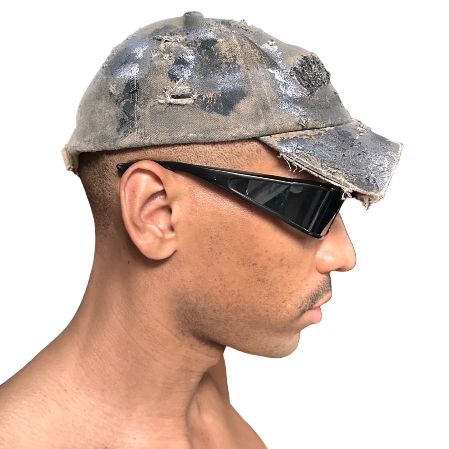 Right view of ASTROBOI* tan and black New York logo hat with distressed half visor and black and white paint detailing.