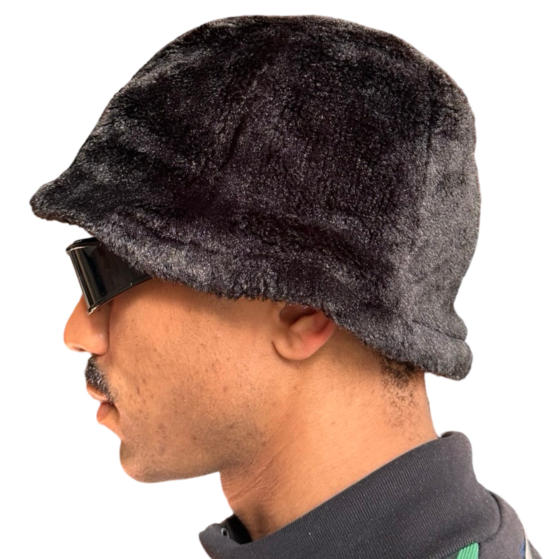 Left side of Vintage black faux-fur bell-shaped bucket hat with soft plush texture, shown in good condition.