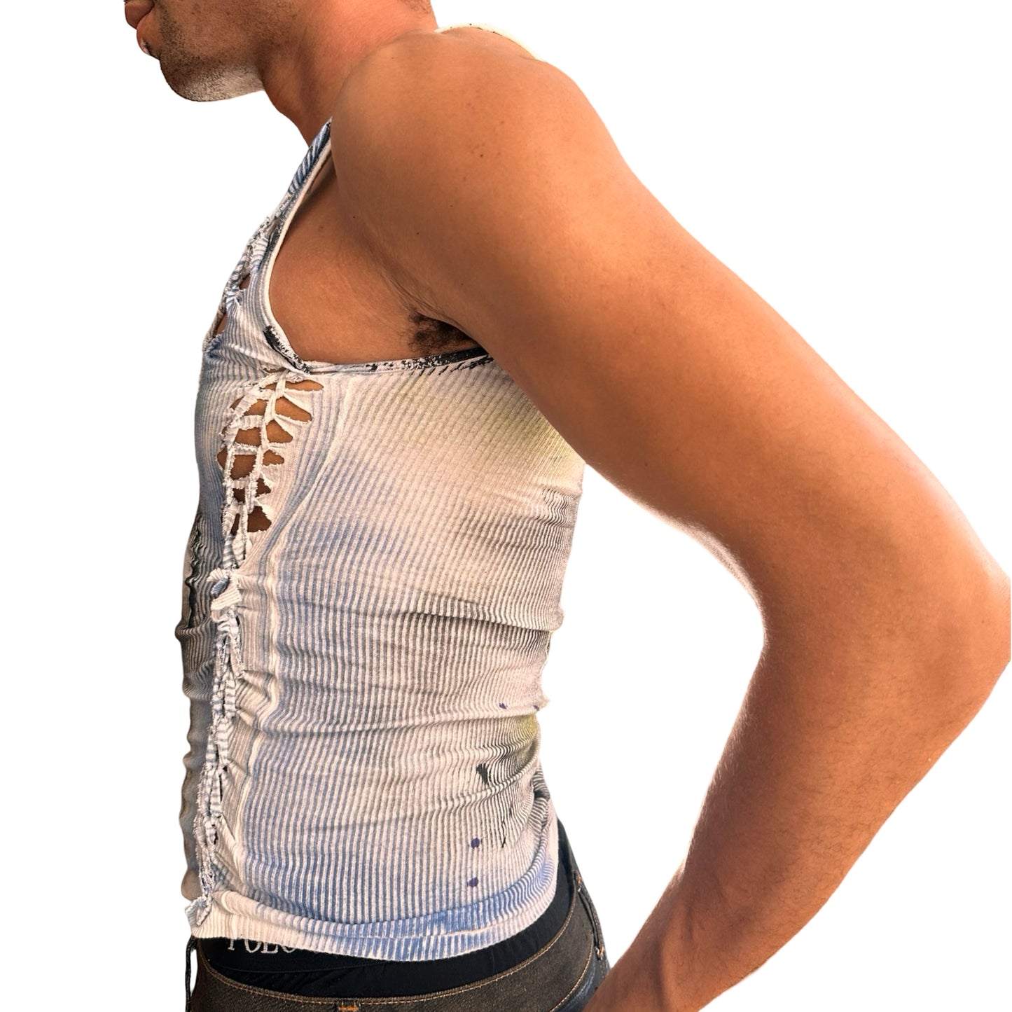 Left of ASTROBOI* ‘Aquatic’ white braided twist tank top with slashed detailing and form-fitting cut. Handmade custom piece from ASTROBOI* STUDIO in NYC.