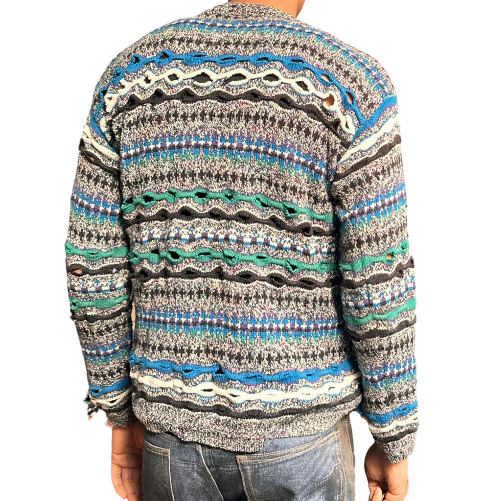 ASTROBOI* black Coogi-style wavy knit sweater with slashes and micro cutouts, distressed texture, medium size. Back side view 