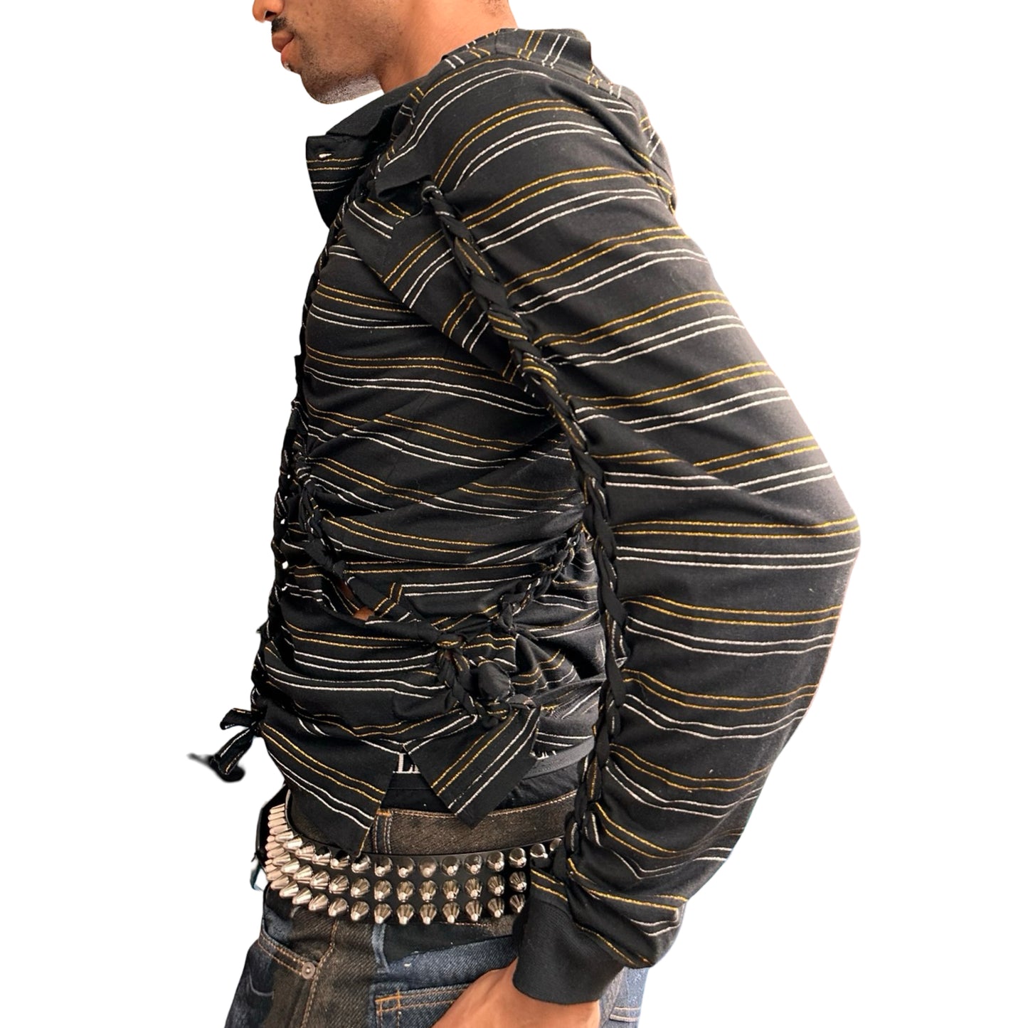 Left side of ASTROBOI* ‘Glam’ black metallic striped polo with braided twist detailing, gold and silver stripes, and a fitted body. Custom piece handmade in NYC.