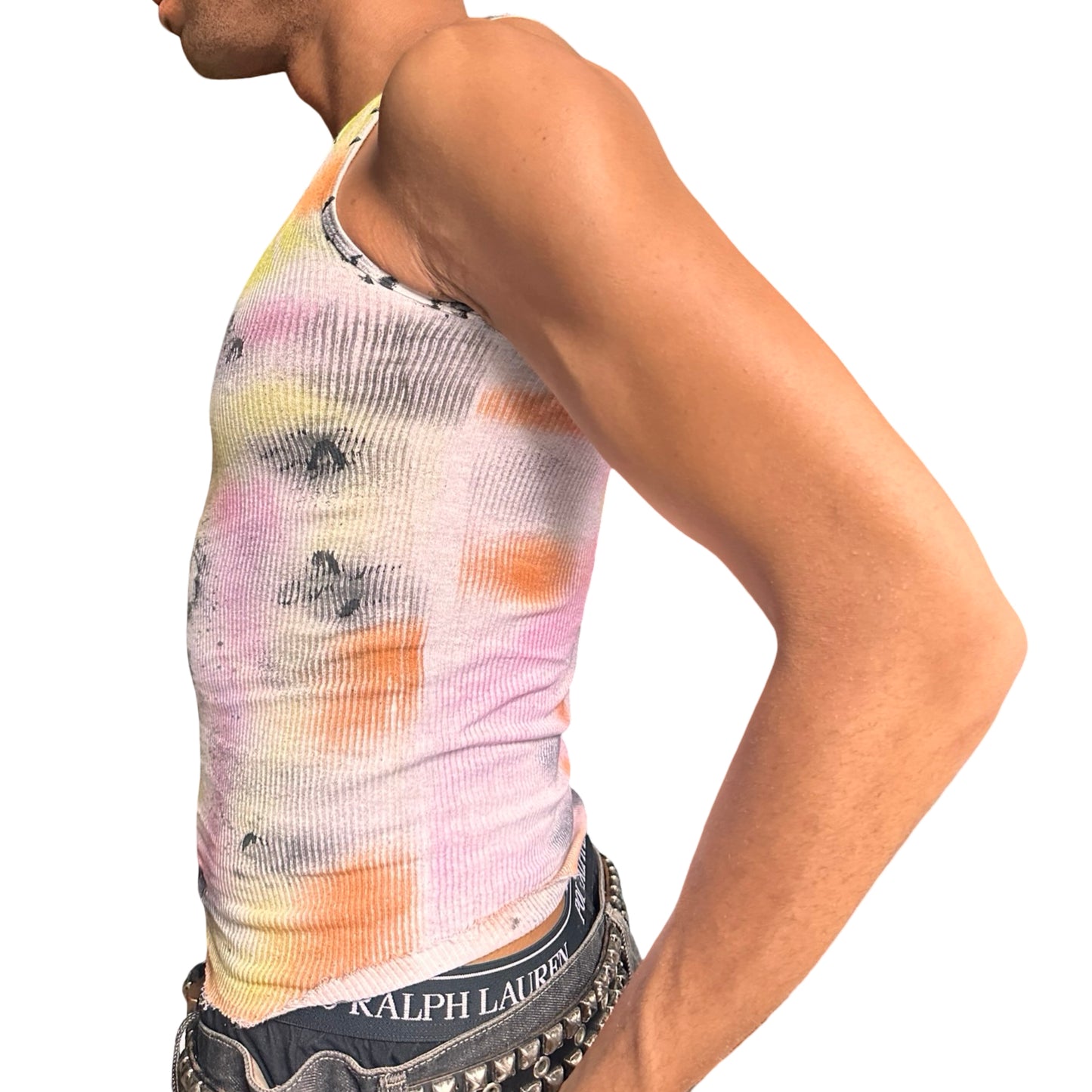 Person wearing a colorful graphic tank top on a white background