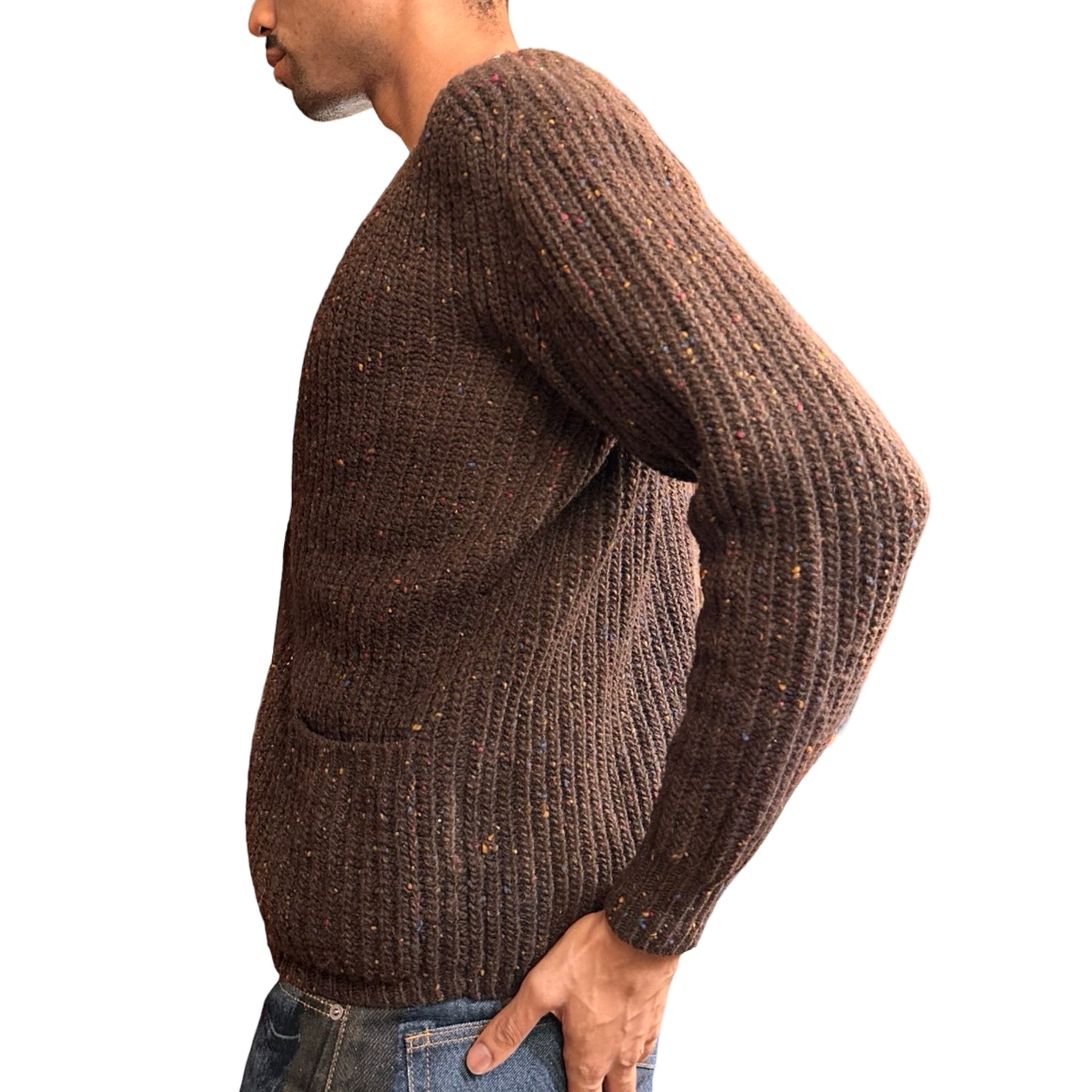 Man wearing a brown knitted sweater on a white background