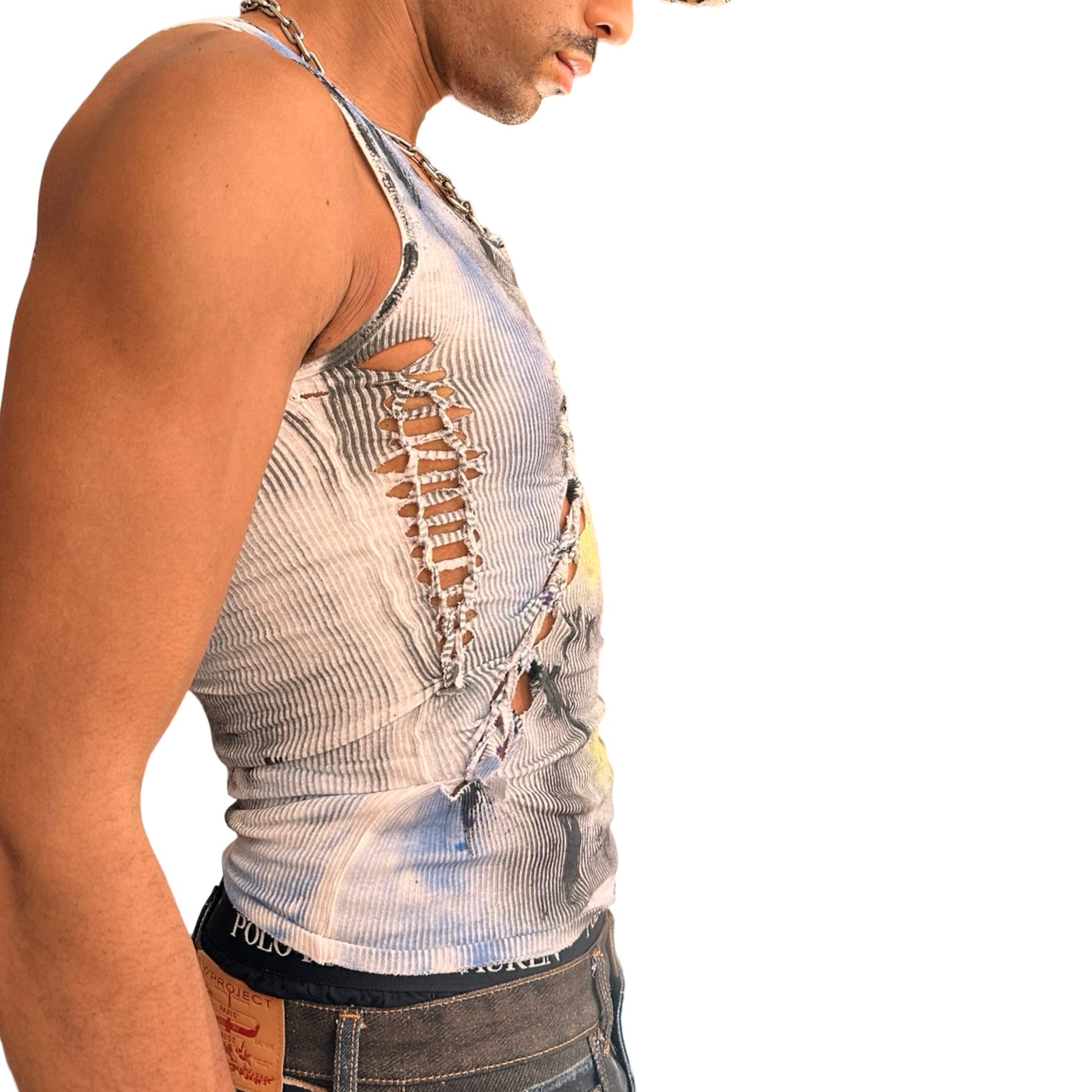 Right side of ASTROBOI* ‘Aquatic’ white braided twist tank top with slashed detailing and form-fitting cut. Handmade custom piece from ASTROBOI* STUDIO in NYC.