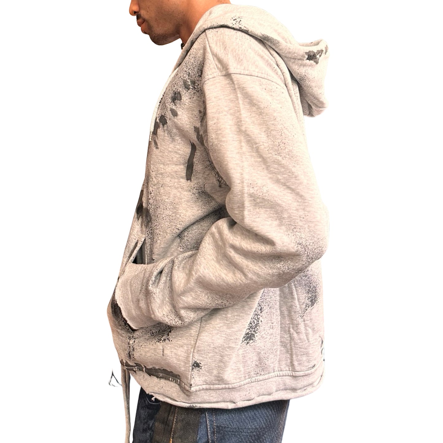 Left side of ASTROBOI* grey distressed painted sweatshirt in XL with black hand-painted graphics, raw hem, and relaxed fit. Custom NYC streetwear.