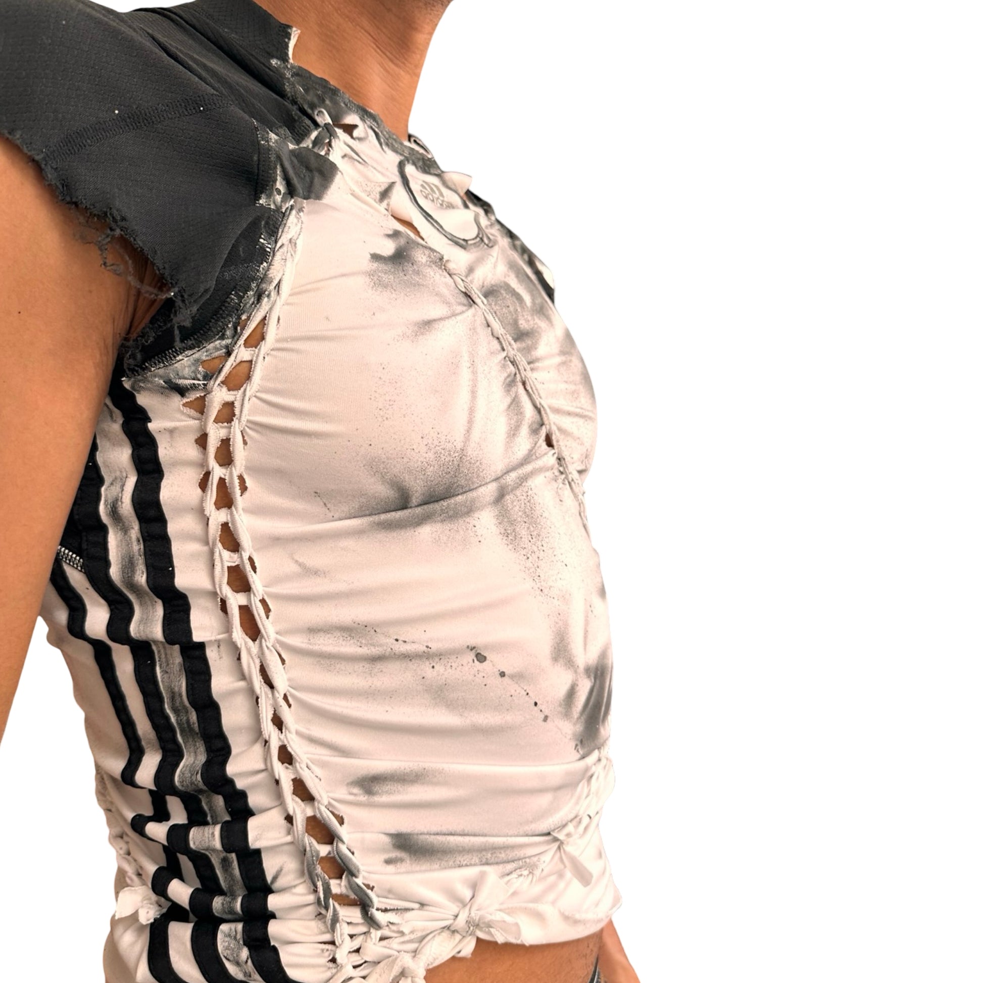 Left side close up of ASTROBOI* x Adidas white compression T-shirt with black hand-painted details and braided twists. Custom streetwear piece made in NYC by ASTROBOI* STUDIO. 