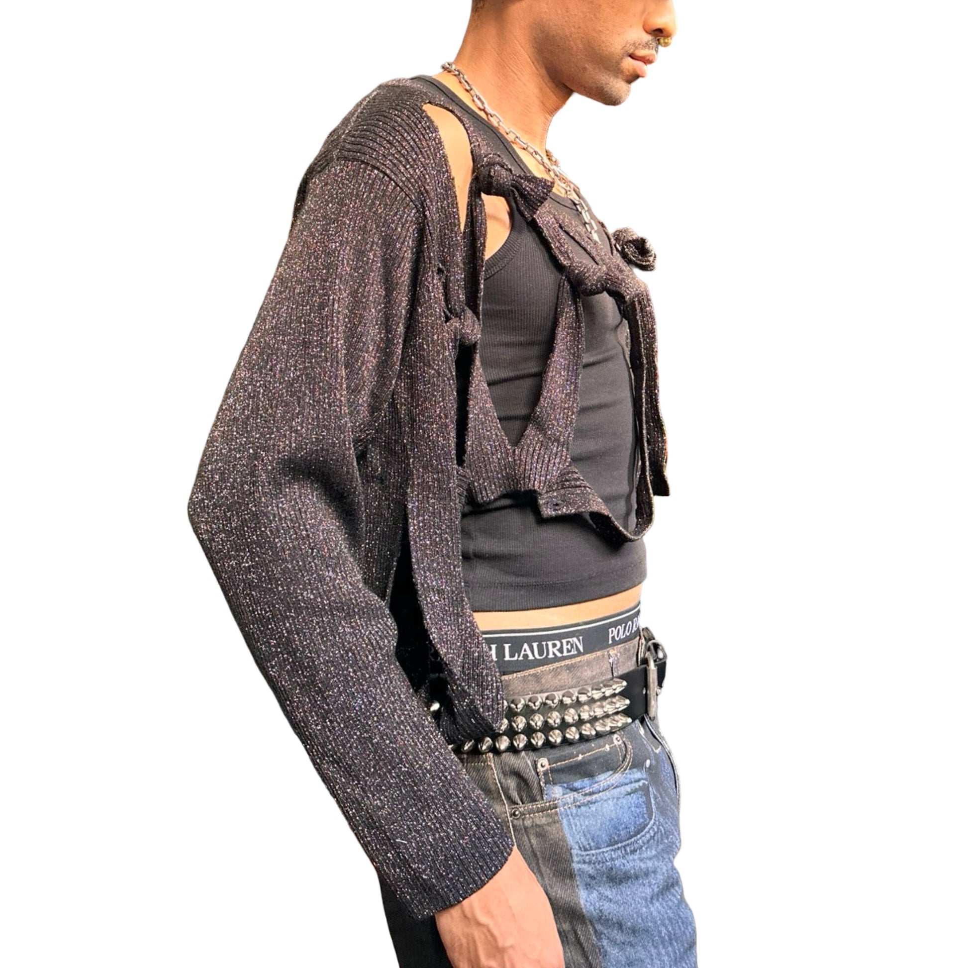 Right side of ASTROBOI* black modular rainbow lurex cardigan with cut outs, shimmer finish, and adjustable hanging straps for custom knot styling. Handmade in Brooklyn.
