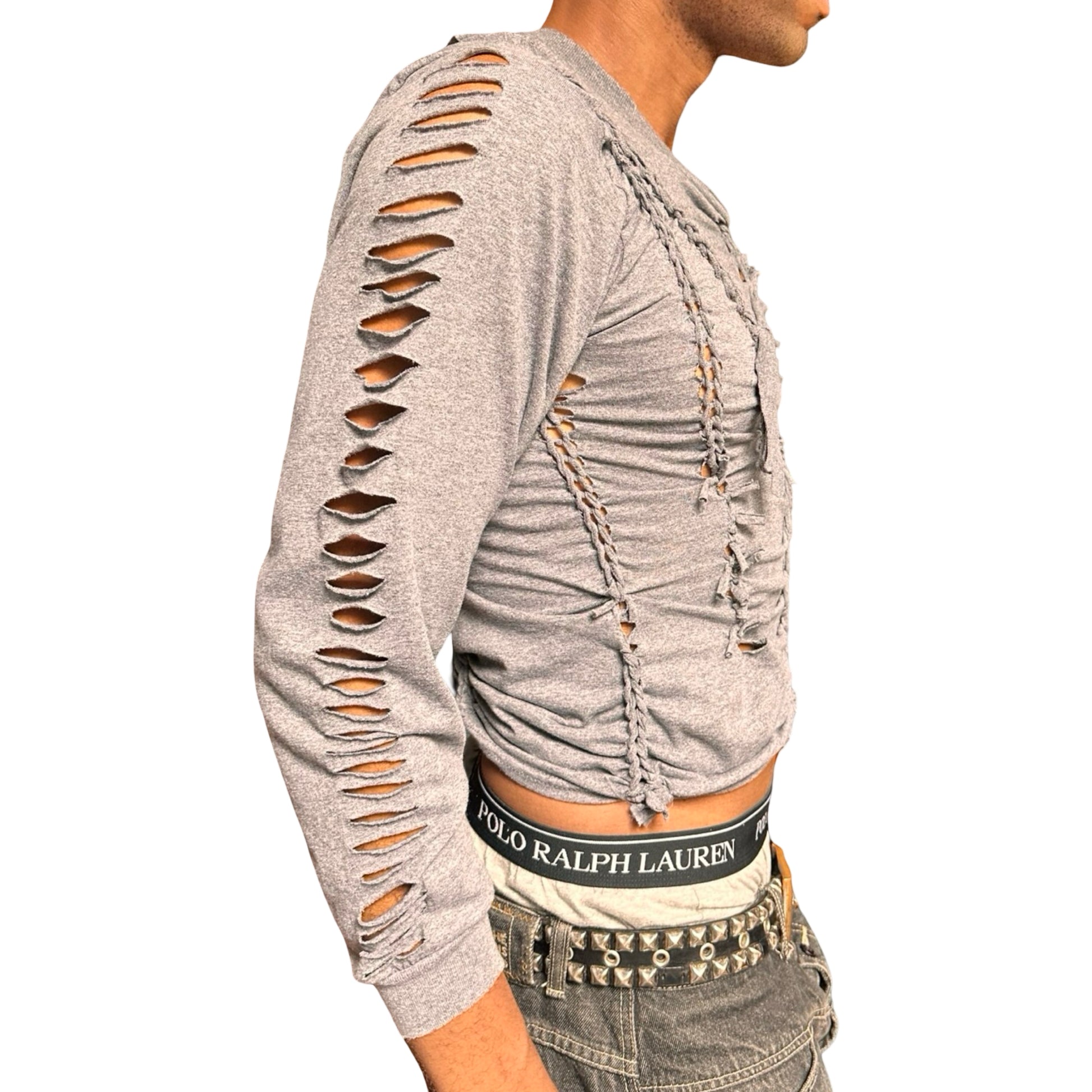 Person wearing a gray braided twist long-sleeve shirt.