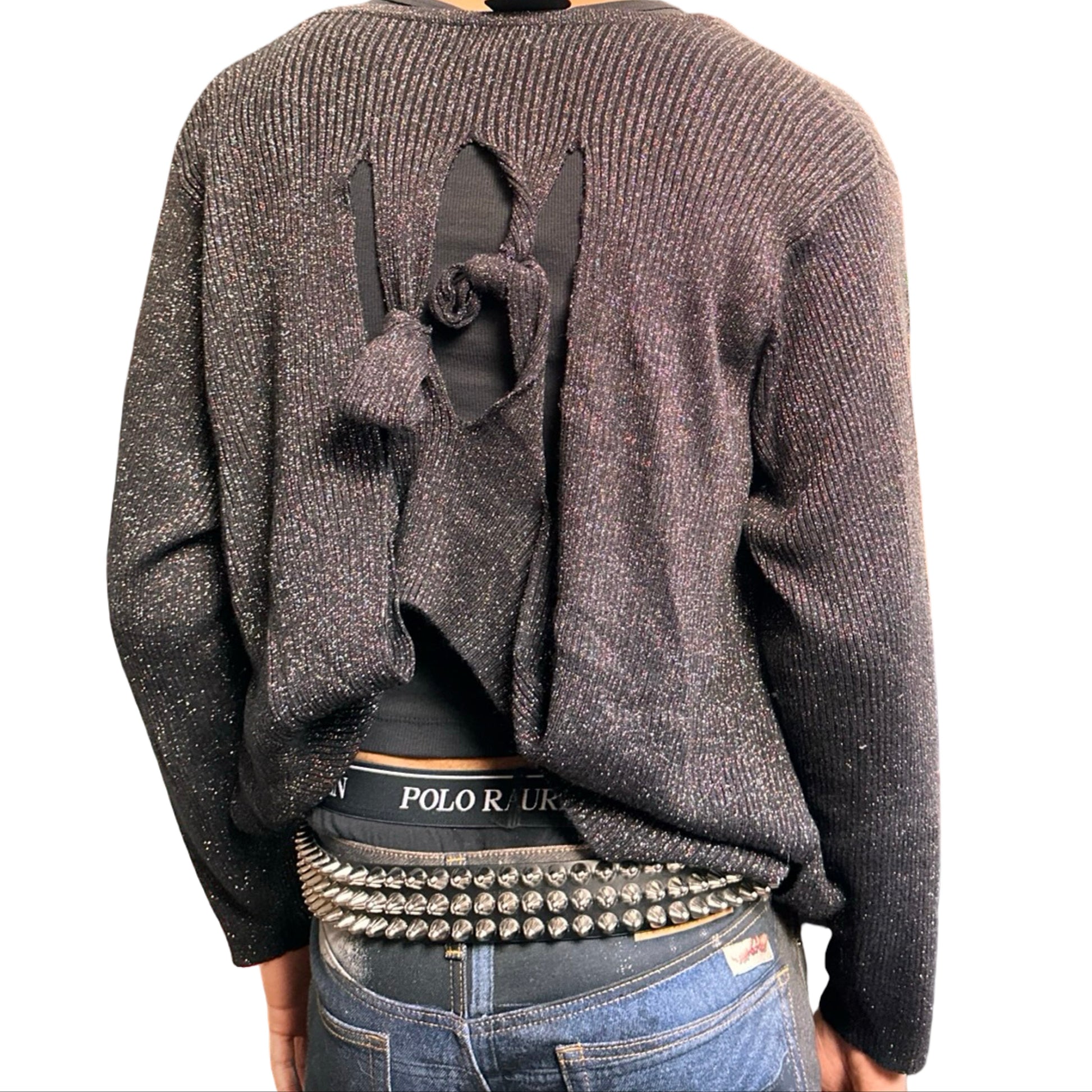 Back view of ASTROBOI* black modular rainbow lurex cardigan with cut outs, shimmer finish, and adjustable hanging straps for custom knot styling. Handmade in Brooklyn.