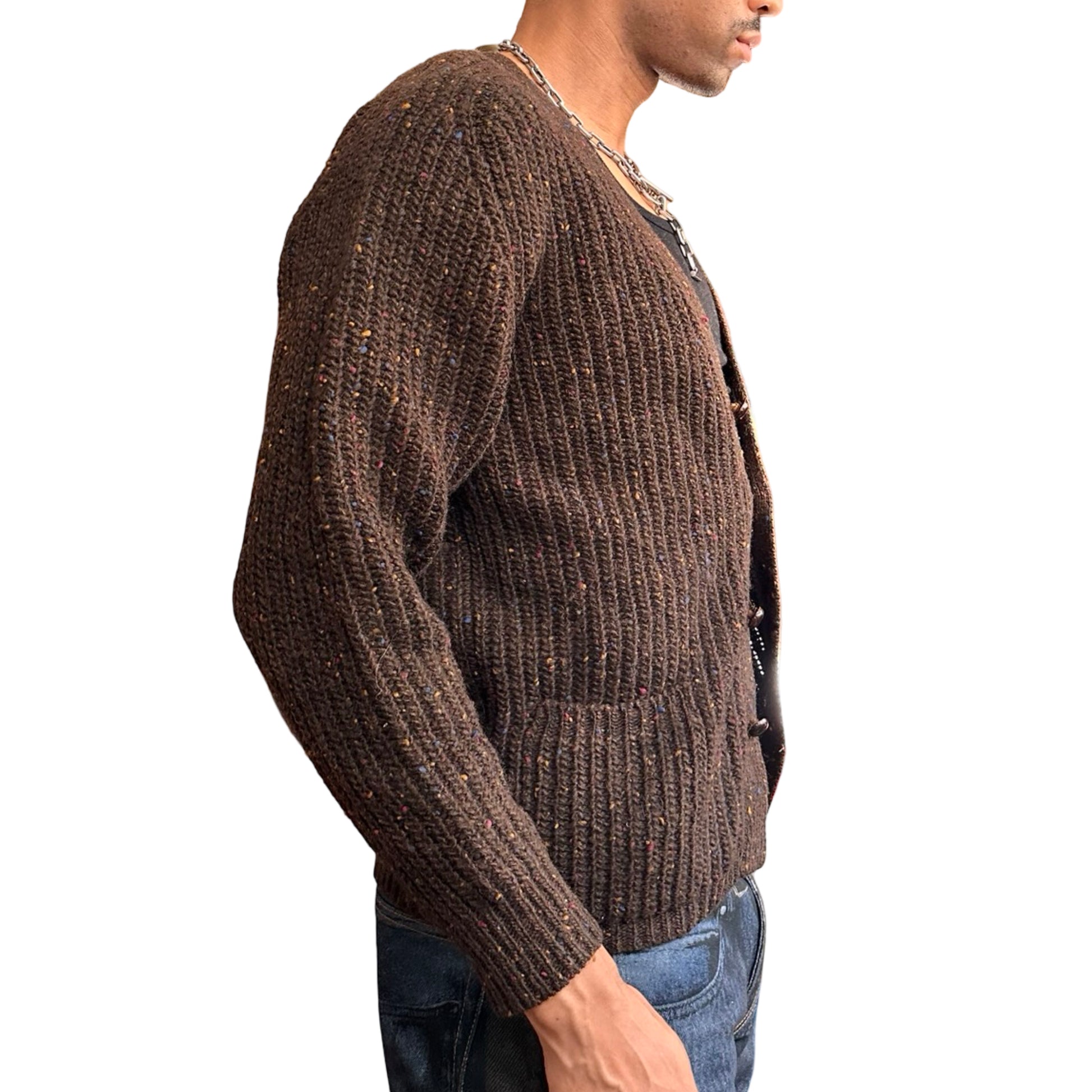 Man wearing a brown knitted cardigan on a white background