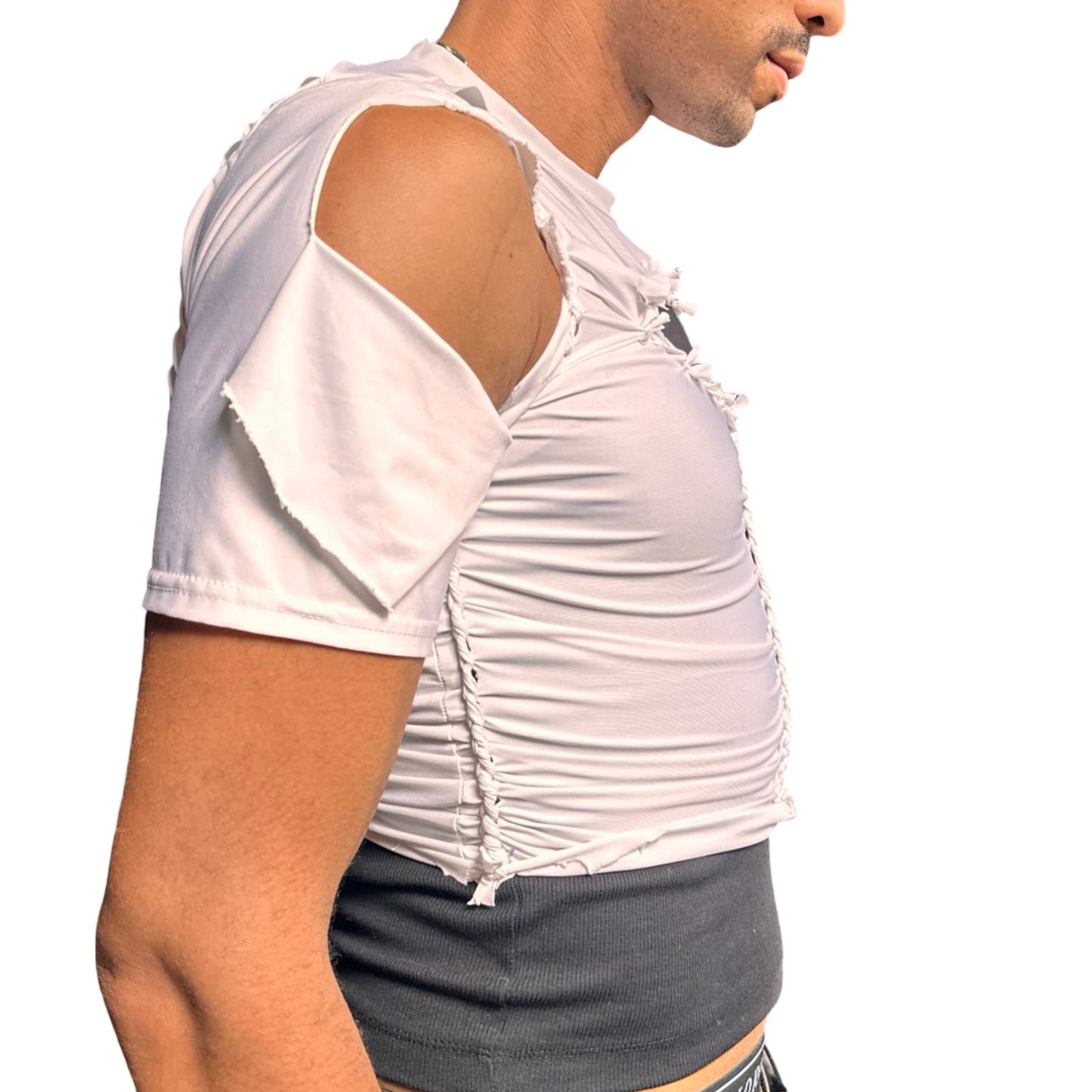 Right side of ASTROBOI* x O’NEIL white braided compression top with deconstructed logo, front body braids, and slim fit. Handmade in Brooklyn with UPF 50+ fabric.