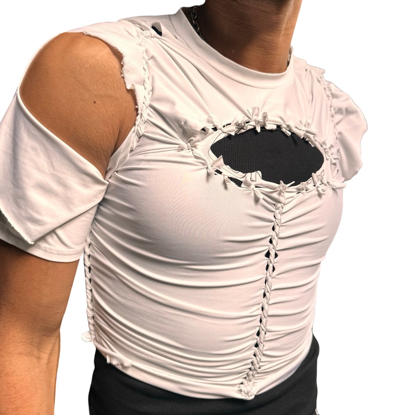 Front left of ASTROBOI* x O’NEIL white braided compression top with deconstructed logo, front body braids, and slim fit. Handmade in Brooklyn with UPF 50+ fabric.