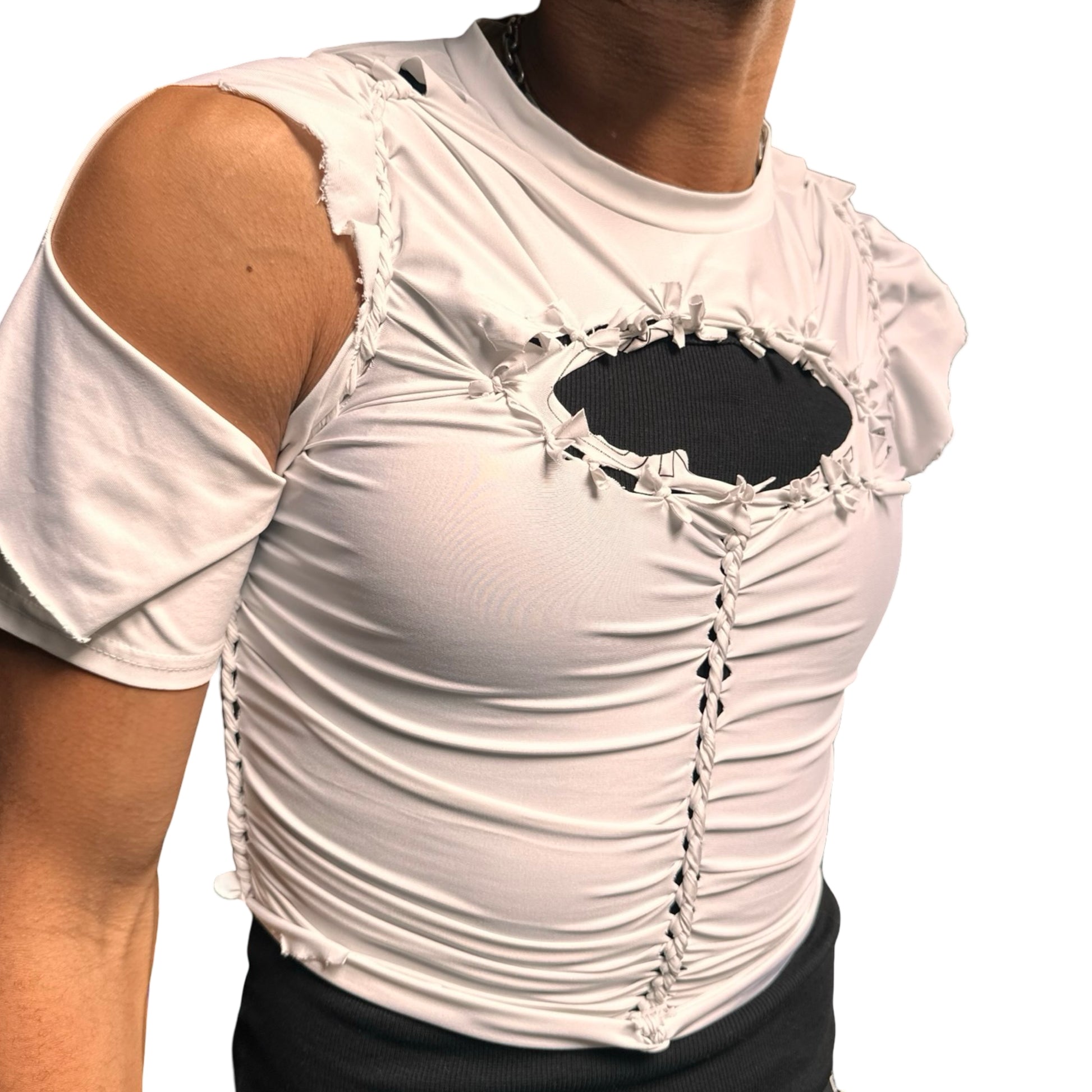 Front left of ASTROBOI* x O’NEIL white braided compression top with deconstructed logo, front body braids, and slim fit. Handmade in Brooklyn with UPF 50+ fabric.