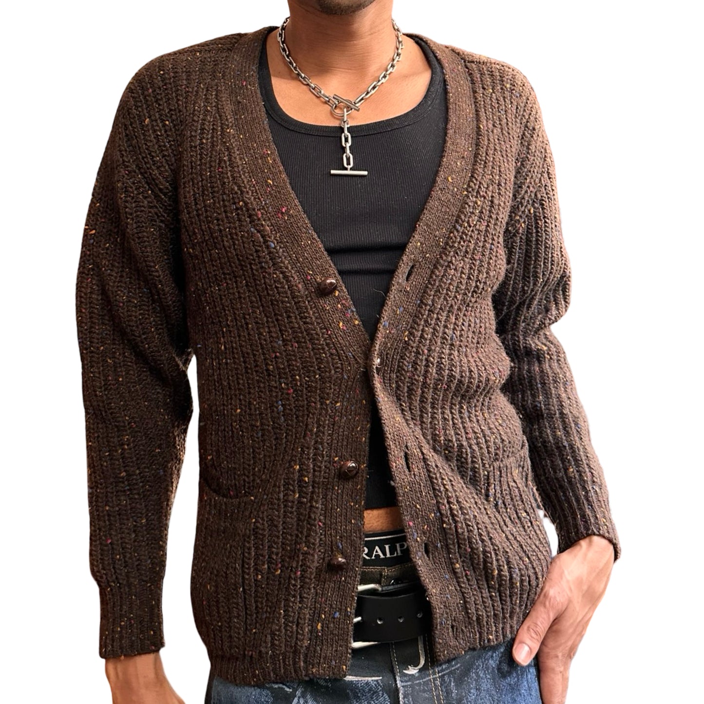 Brown cardigan worn by a person on a white background